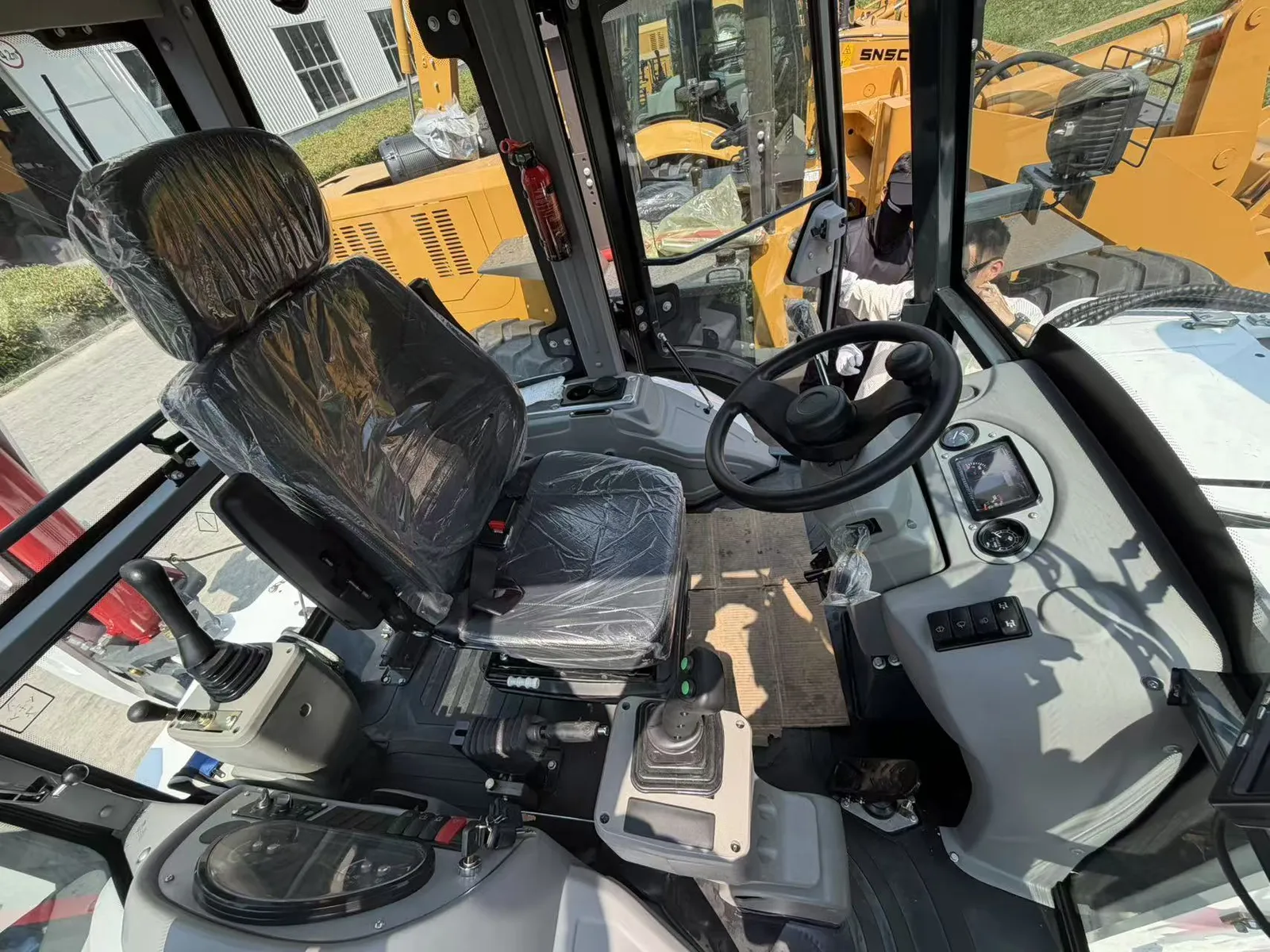 Cab interior gallery photo of the YUYAN 388 backhoe loader